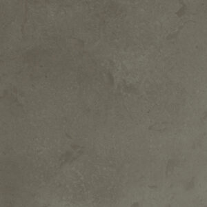 Close-up detail of Select Pewter concrete luxury vinyl tile, showcasing soft gray tones, subtle mottling, and natural concrete-inspired texture with understated tonal variation.
