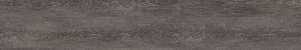 Dark gray rustic wood look luxury vinyl plank in a random pattern. 