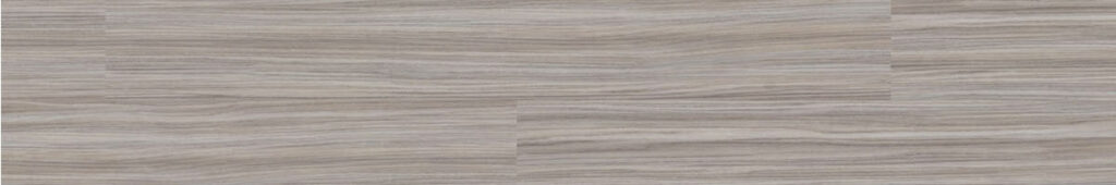 Gray, linear patterned look luxury vinyl plank in a random pattern.