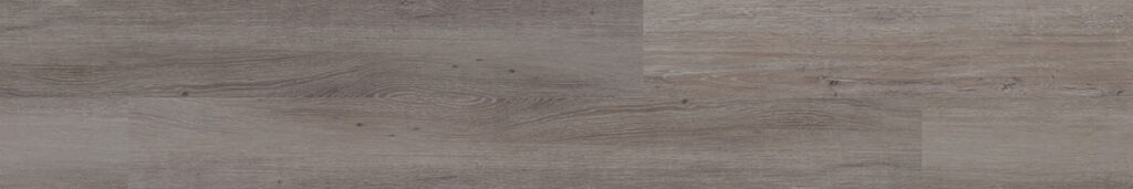 Gray, rustic wood look luxury vinyl plank in a random pattern.