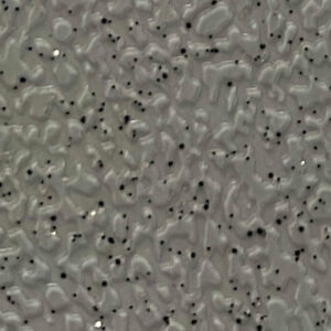 Close-up image of CleanTred vinyl sheet flooring in a speckled gray finish. The surface features a subtle texture with scattered light and dark flecks, providing visual depth and slip resistance for emergency vehicles and utility flooring applications.