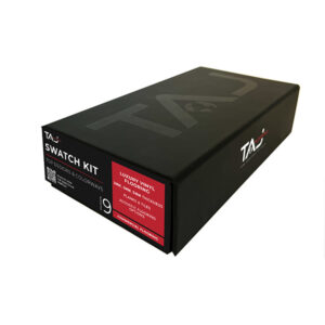 Black TAJ Swatch Kit box featuring branded graphics and labeling for Top Designs & Colorways in commercial luxury vinyl flooring, presented in a sleek, compact sample box design.